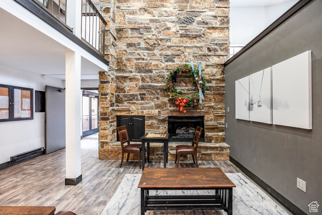 View of patio with visible vents and a stone fireplace