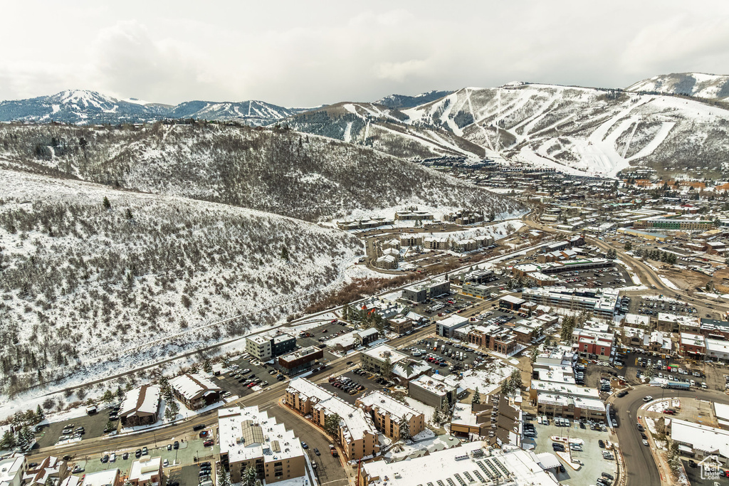 Snowy aerial view with a mountain view