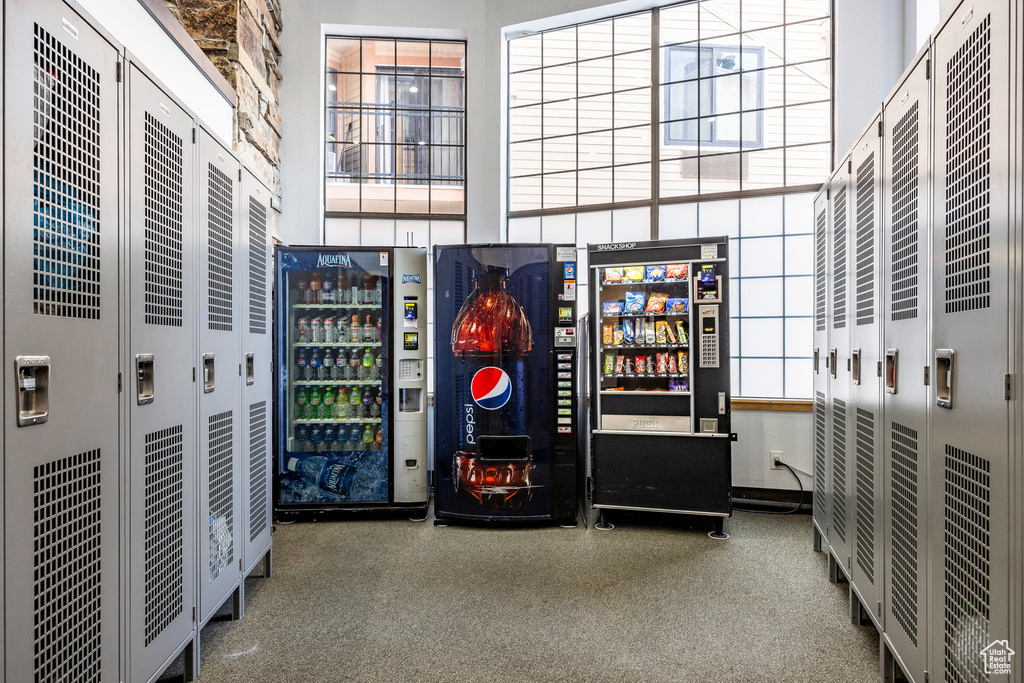 Misc room with a high ceiling and beverage cooler