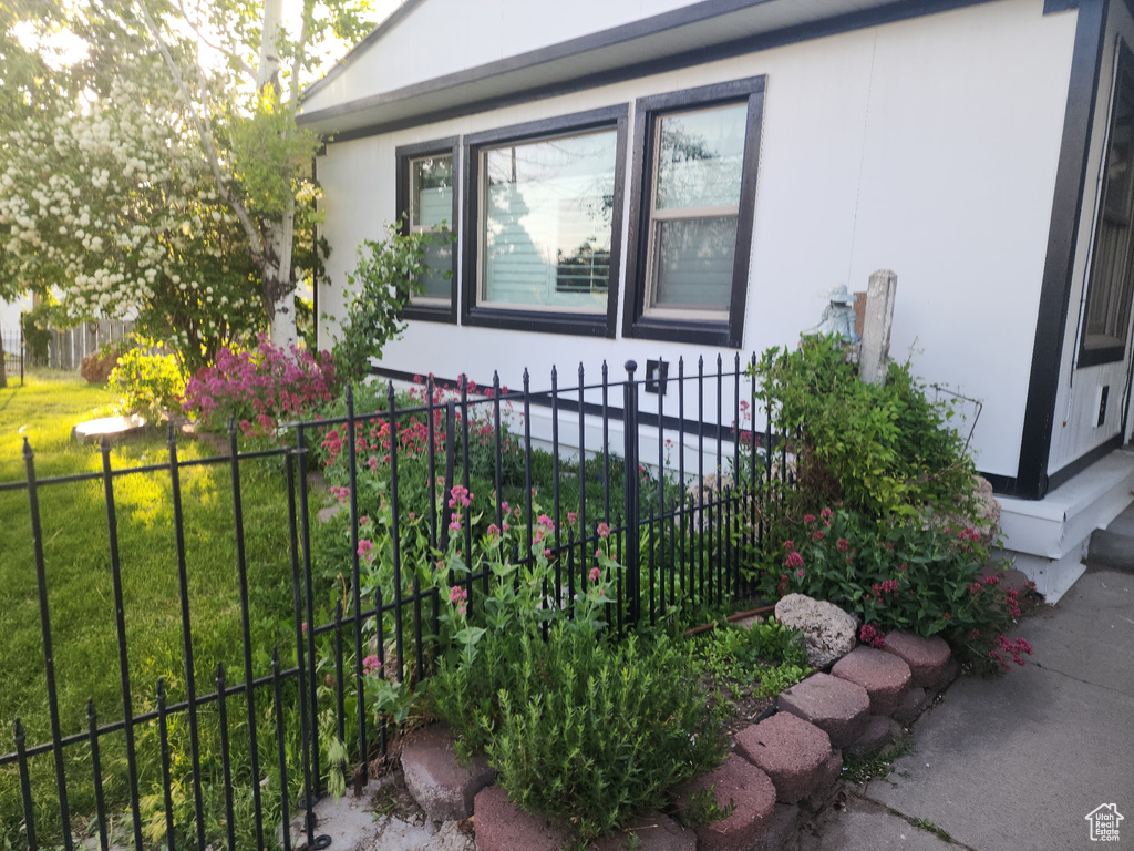View of side of property featuring stucco siding
