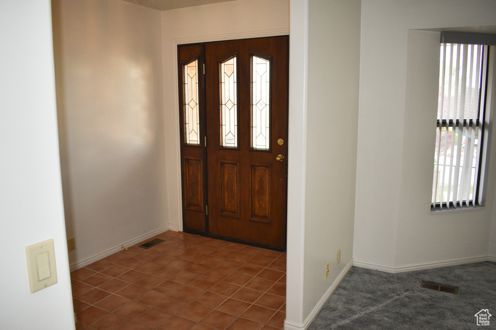 Entryway featuring plenty of natural light