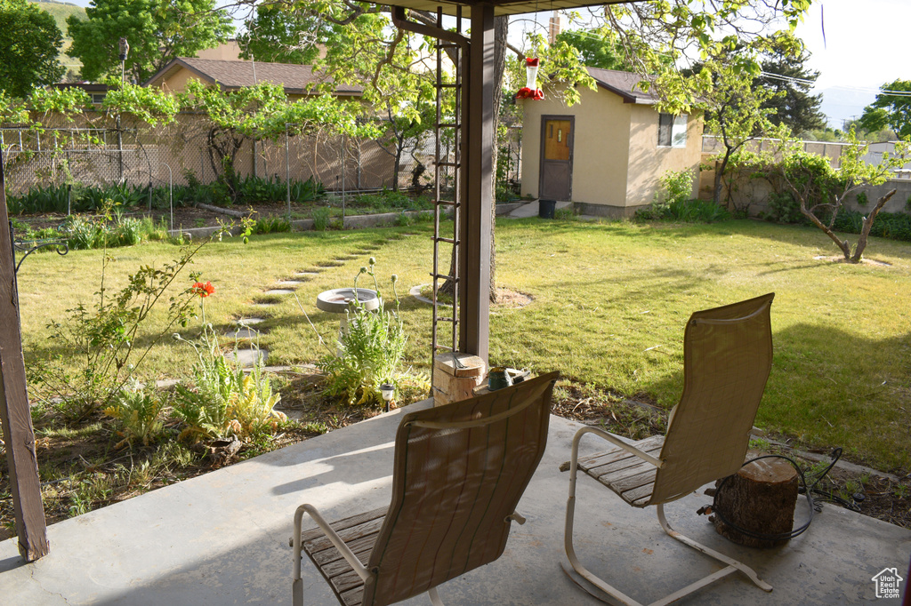 View of yard with a patio area