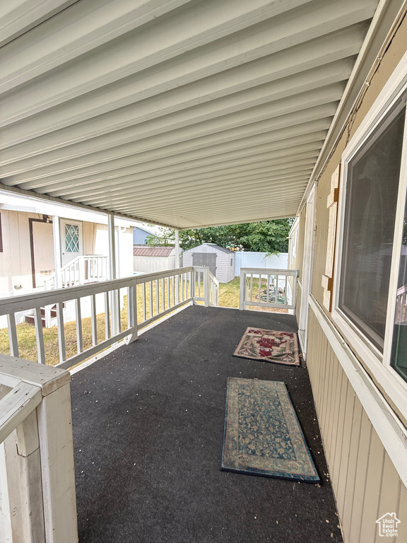 View of patio / terrace with an attached carport
