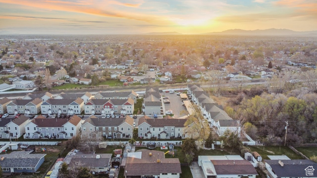 Drone / aerial view with a residential view and a mountain view