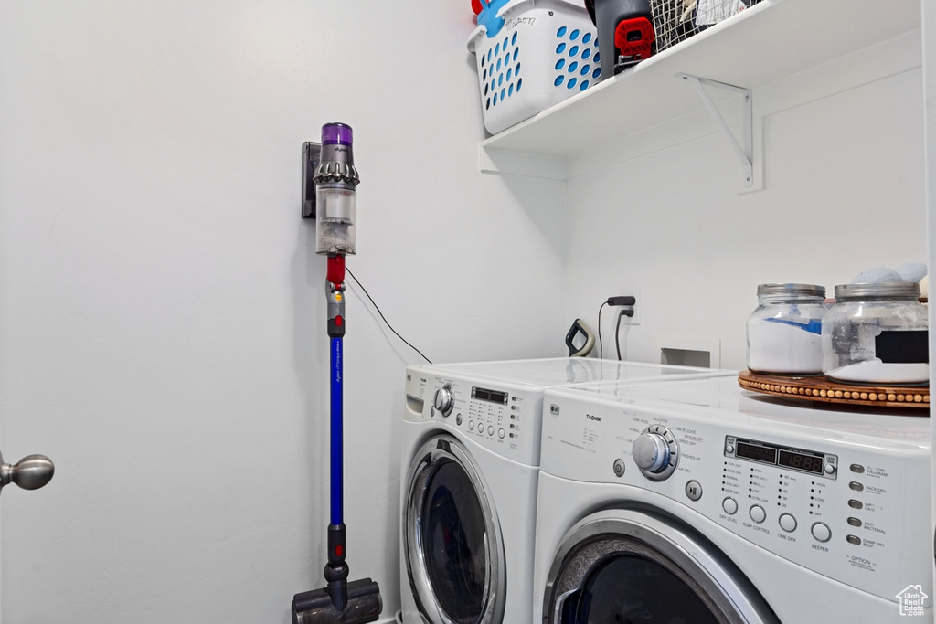 Clothes washing area with washer and clothes dryer