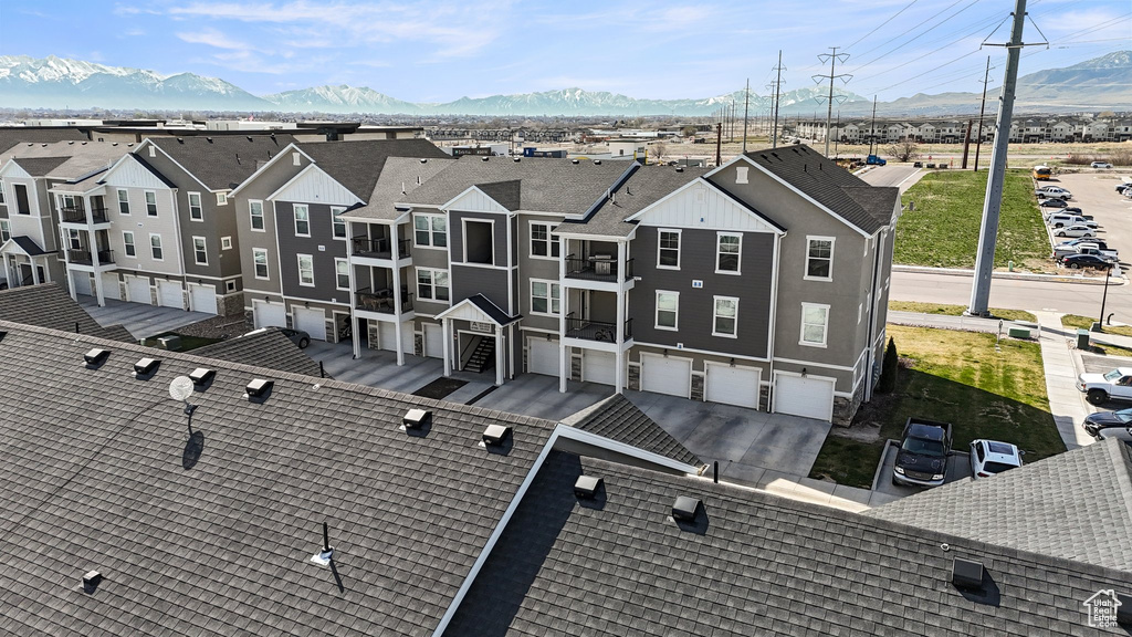 Drone / aerial view with a mountain view and a residential view