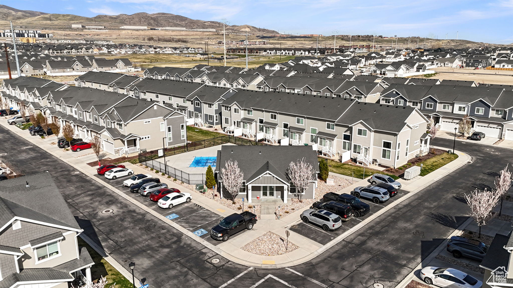 Birds eye view of property featuring a mountain view and a residential view