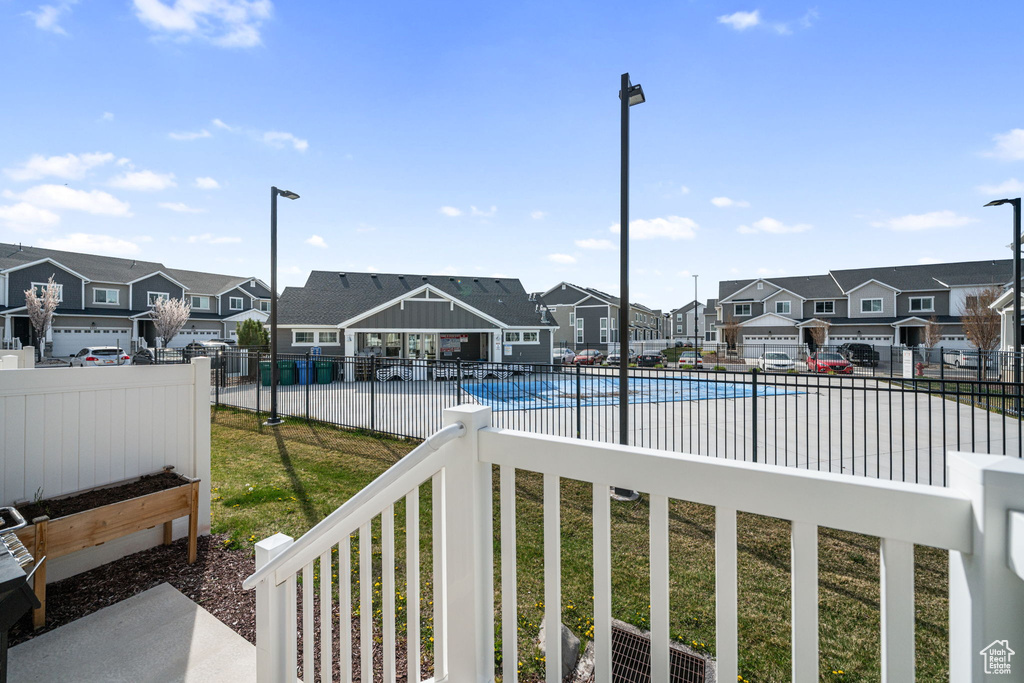 Exterior space with fence and a residential view