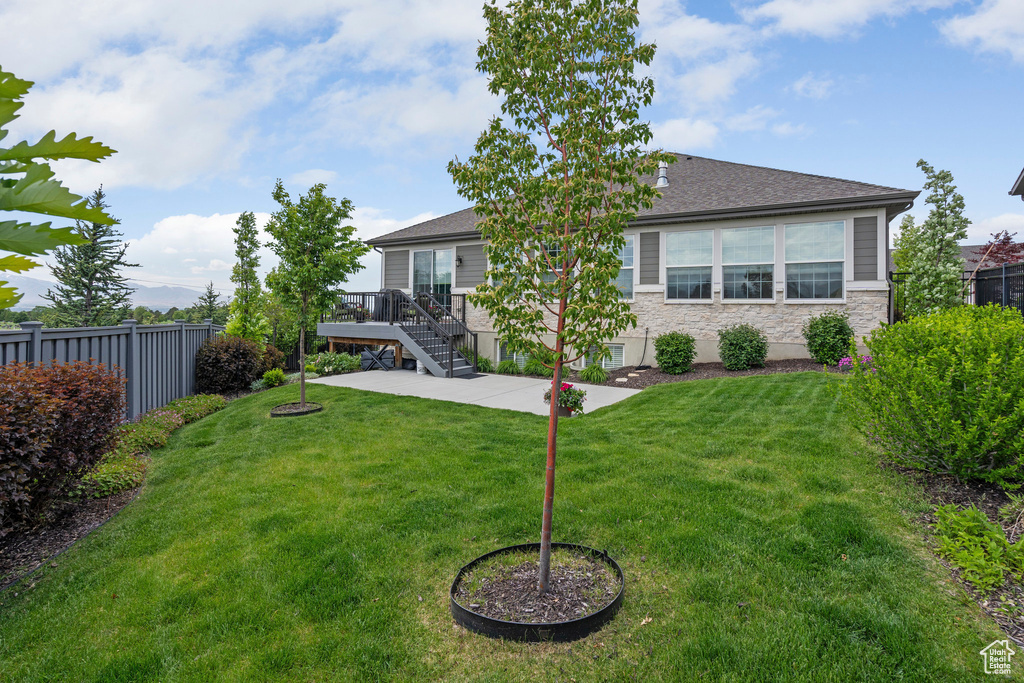 View of yard with a patio area