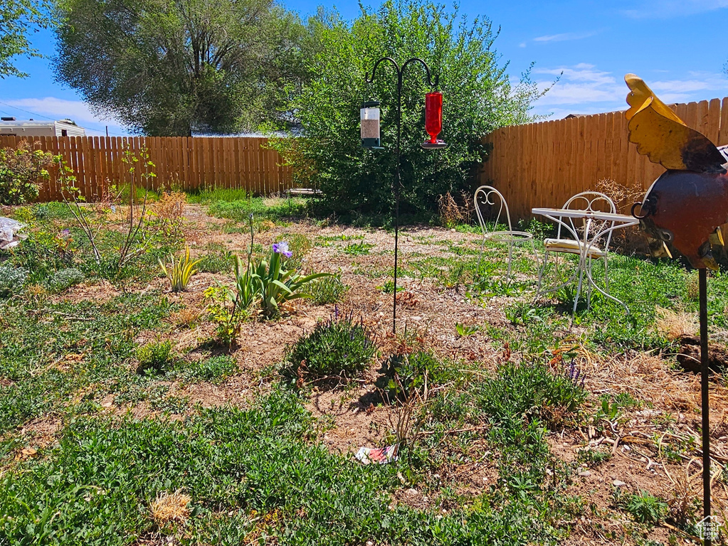 View of yard with fence