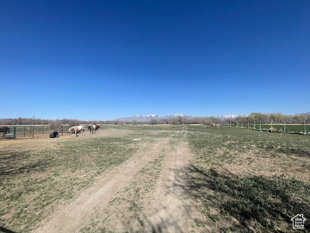 View of dirt / gravel road with a view of countryside