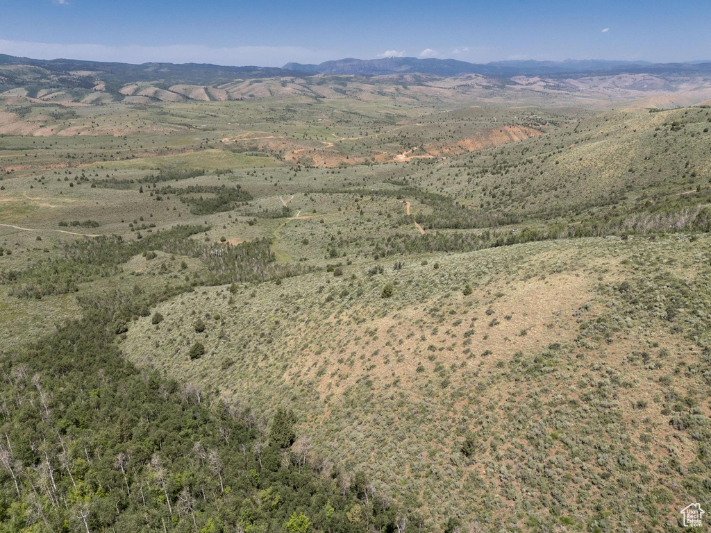 Aerial overview of property\\\'s location featuring a mountainous background