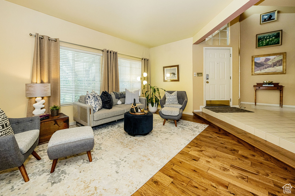 Living room with wood finished floors and baseboards