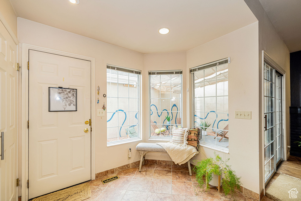 Foyer entrance featuring recessed lighting