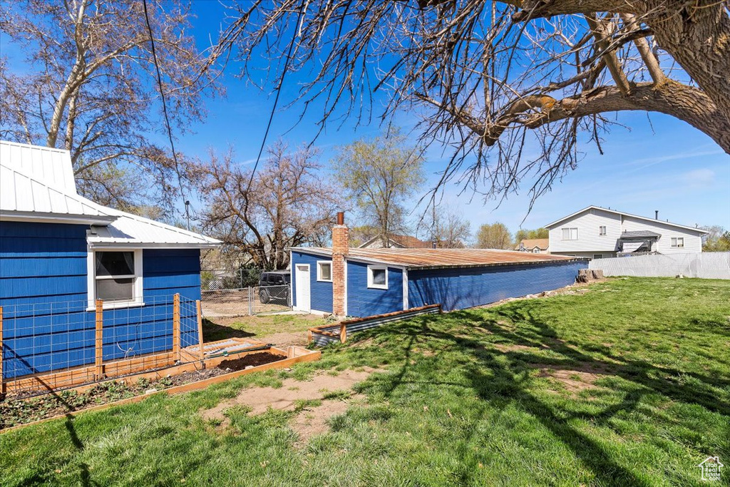 View of yard with fence