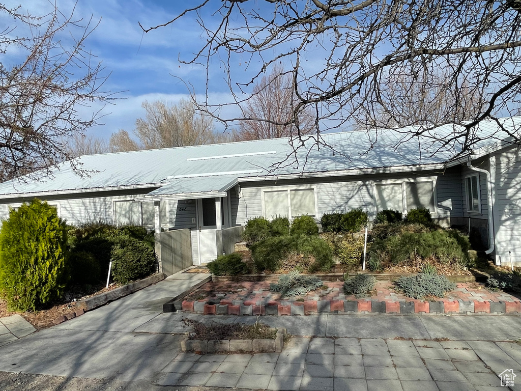 View of front of property featuring metal roof