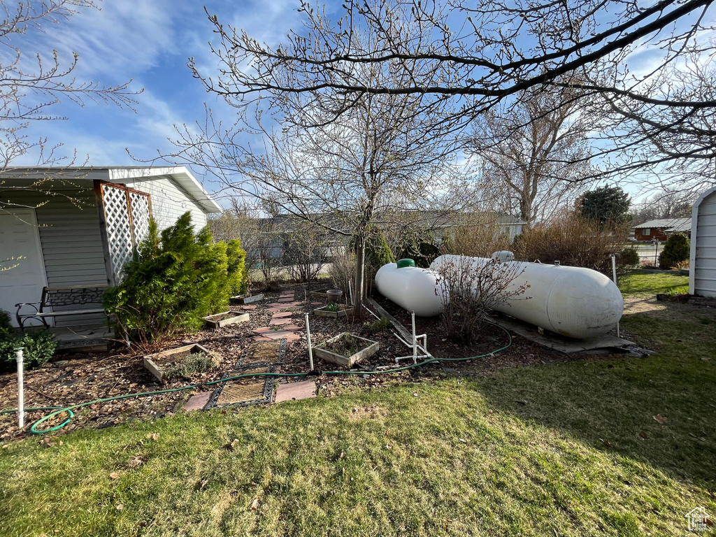 View of yard with a garden