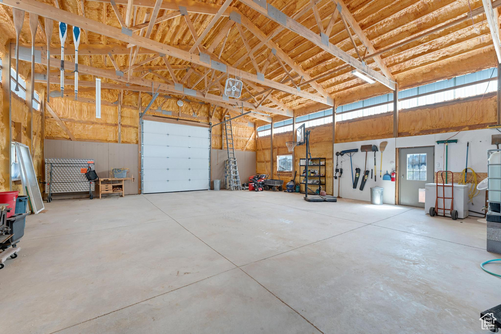Garage featuring a garage door opener