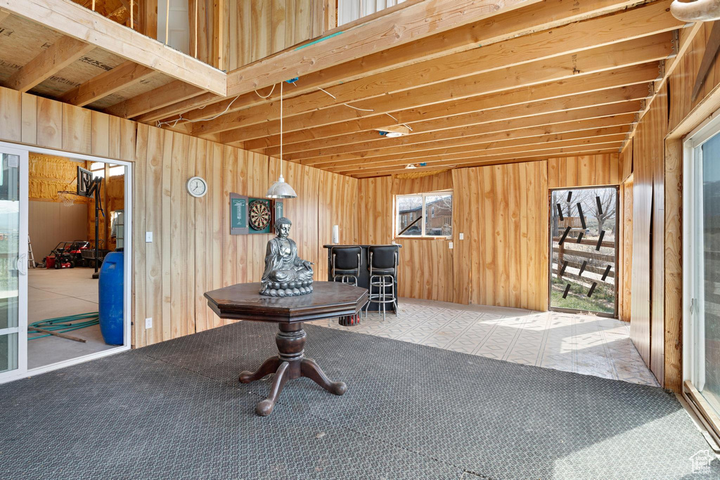 Miscellaneous room with wooden walls