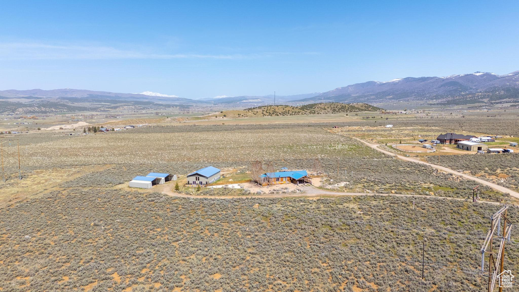 Birds eye view of property featuring a rural view and a mountain view