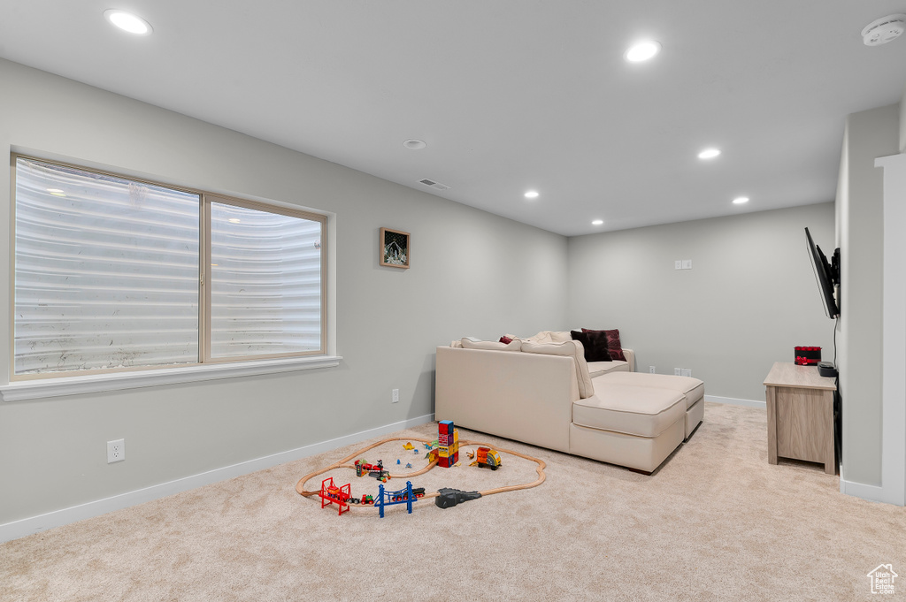 Game room featuring carpet flooring, baseboards, visible vents, and recessed lighting