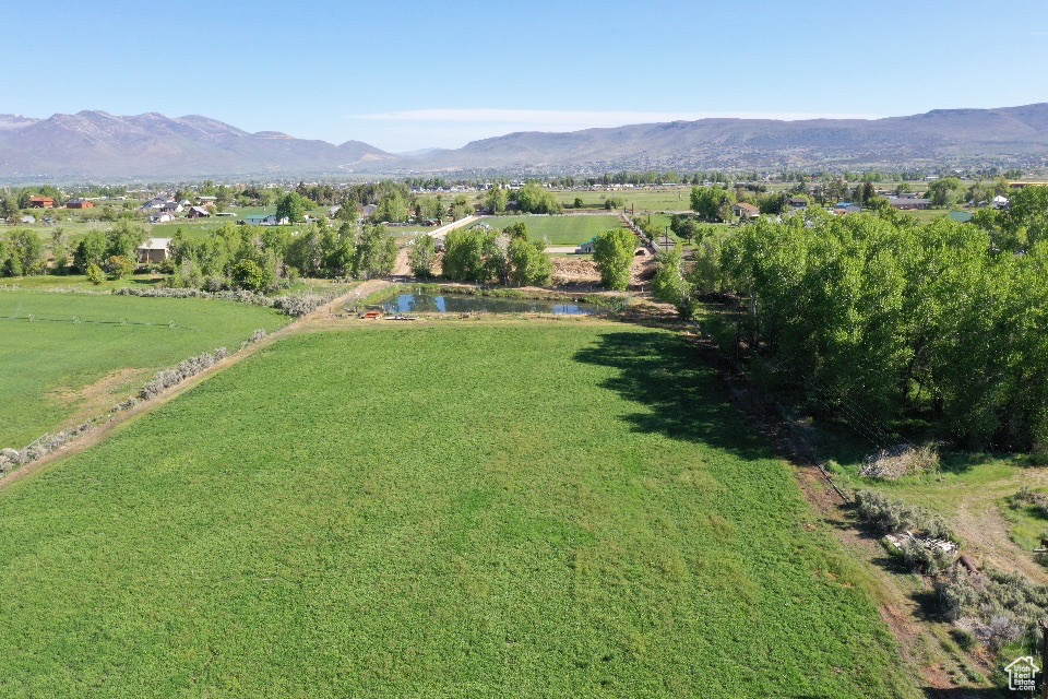 Aerial view of property\'s location with a mountain backdrop