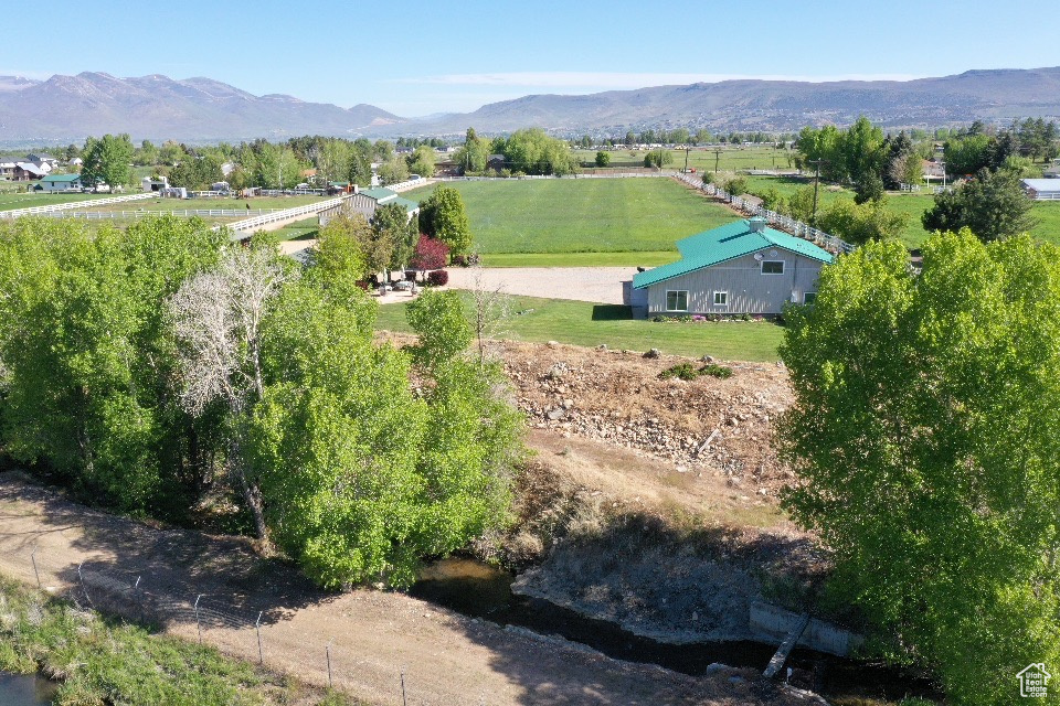 Overview of rural landscape with a mountainous background
