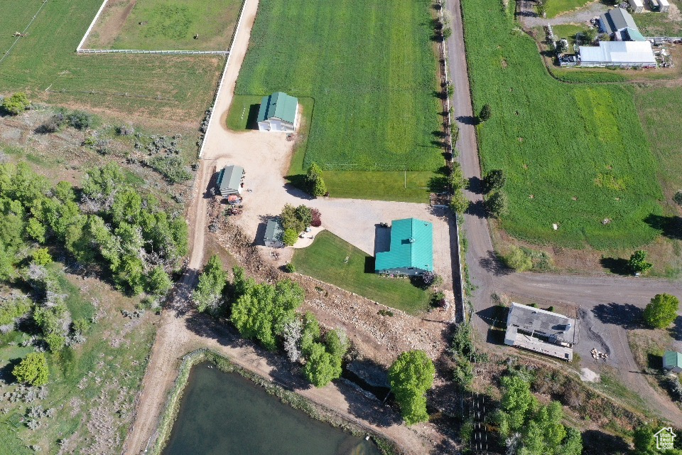 Aerial view of property\'s location with rural landscape and a nearby body of water