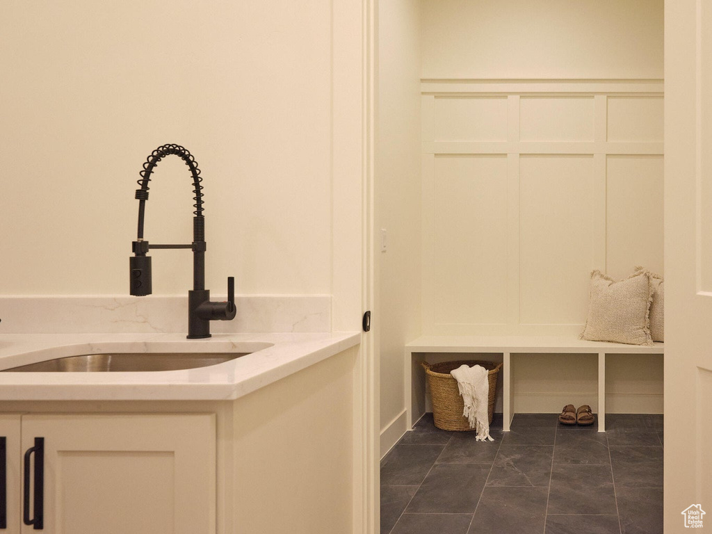 Mudroom featuring a sink