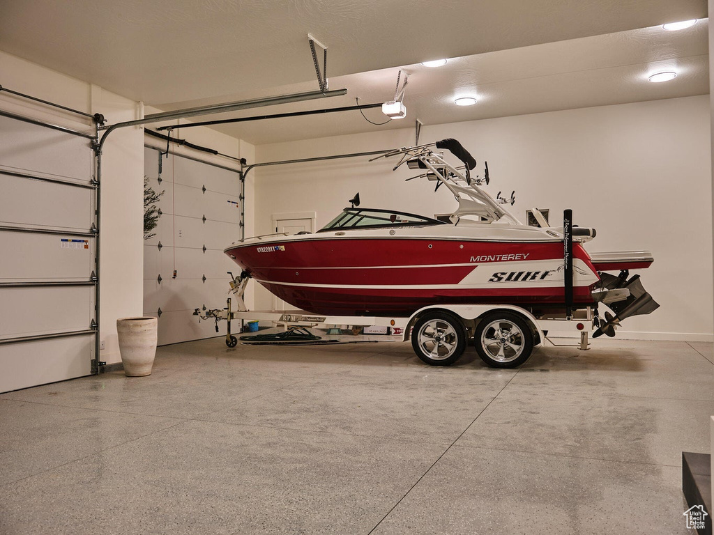 Garage featuring a garage door opener