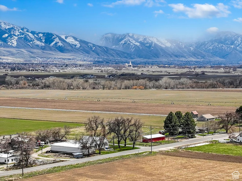 Property view of mountains featuring a rural view