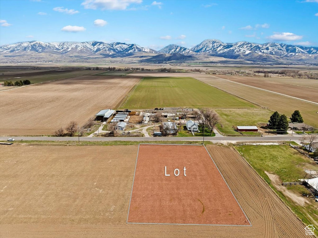 Aerial view featuring a rural view and a mountain view