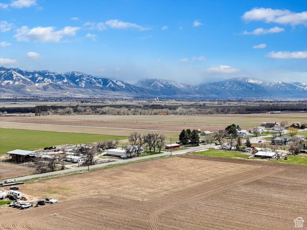 Property view of mountains with a rural view