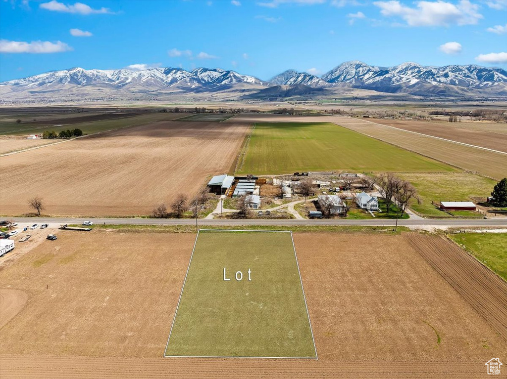 Drone / aerial view with a mountain view and a rural view