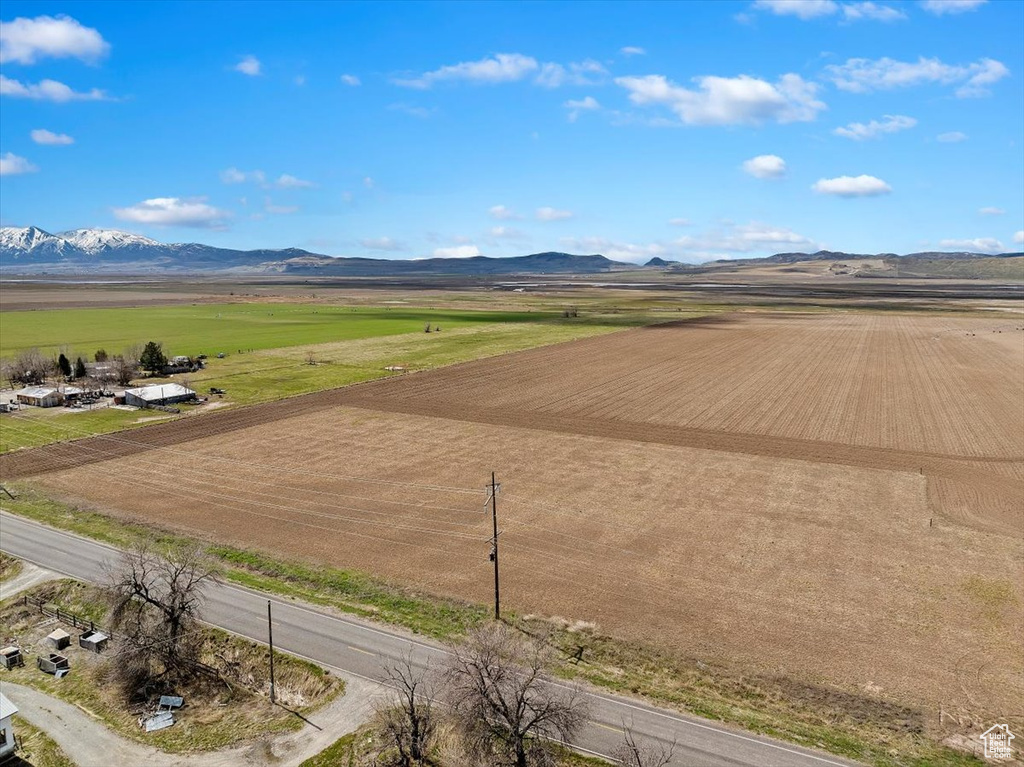Exterior space with a rural view and a mountain view