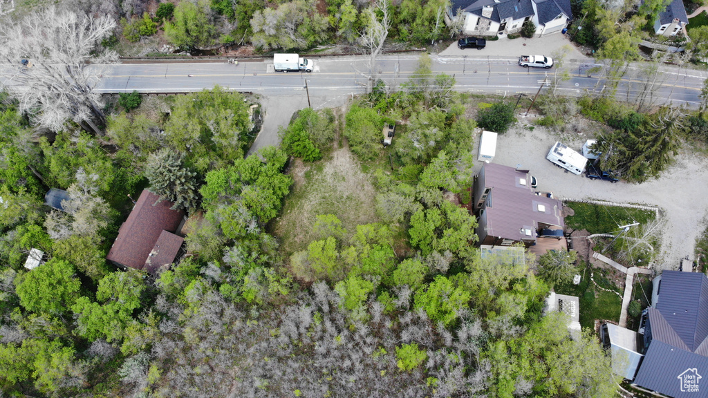 View of property location with nearby suburban area