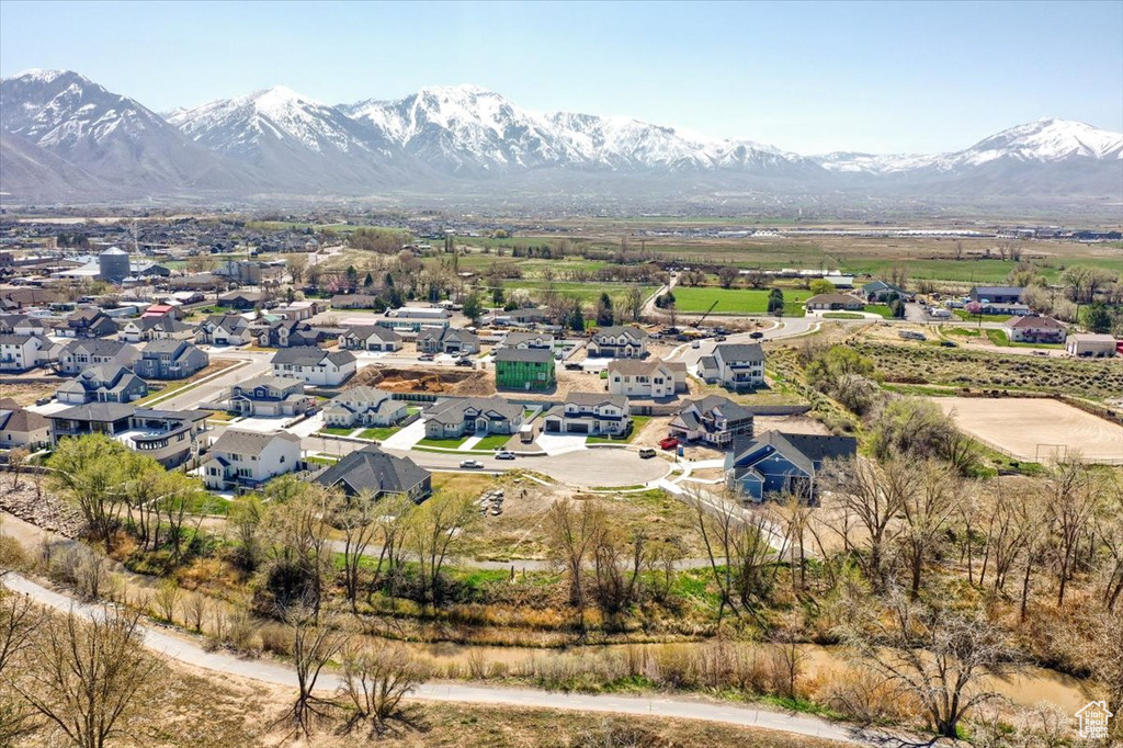 Drone / aerial view with a mountain view and a residential view