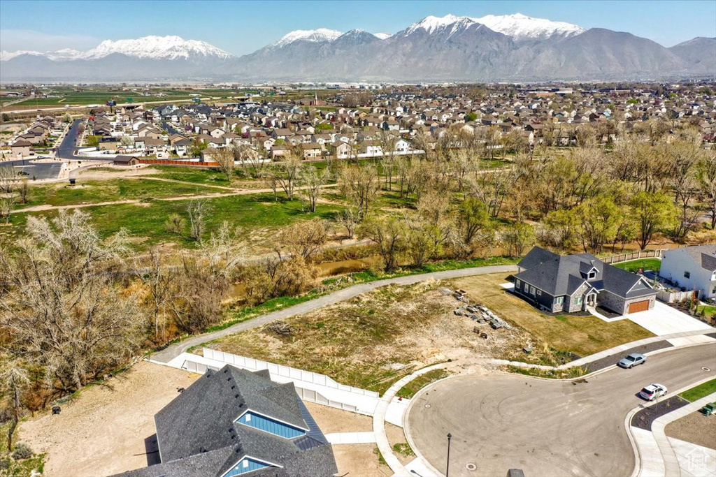 Drone / aerial view featuring a mountain view and a residential view