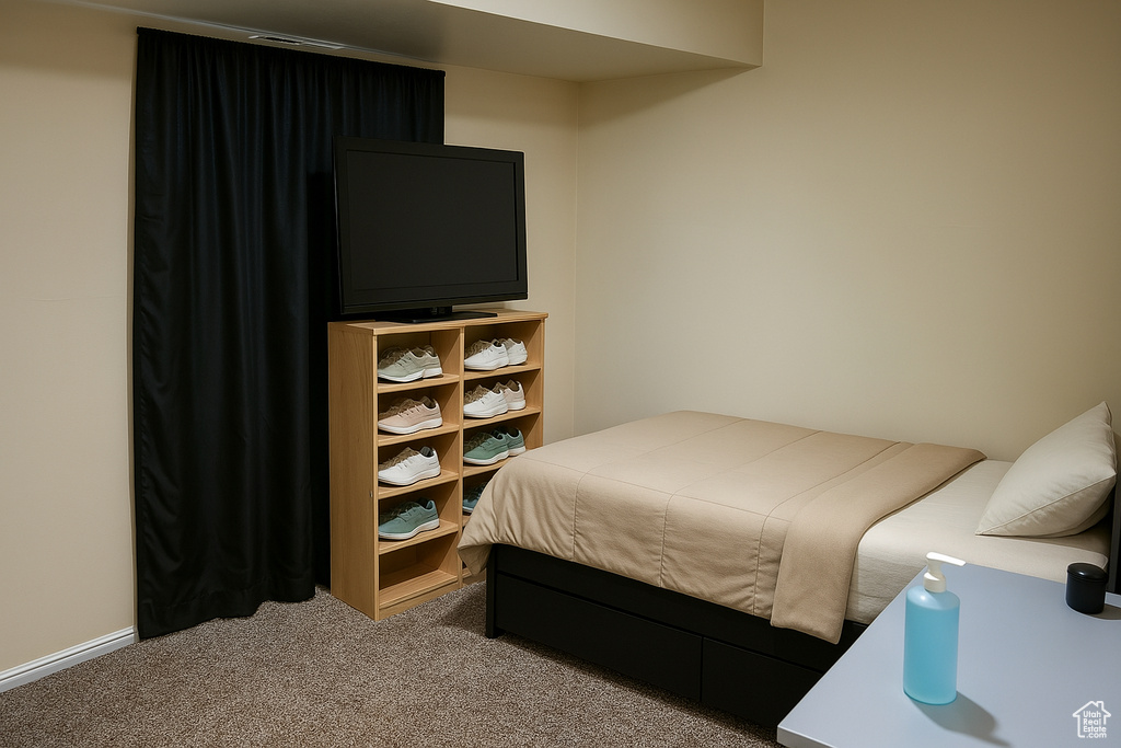 View of carpeted bedroom