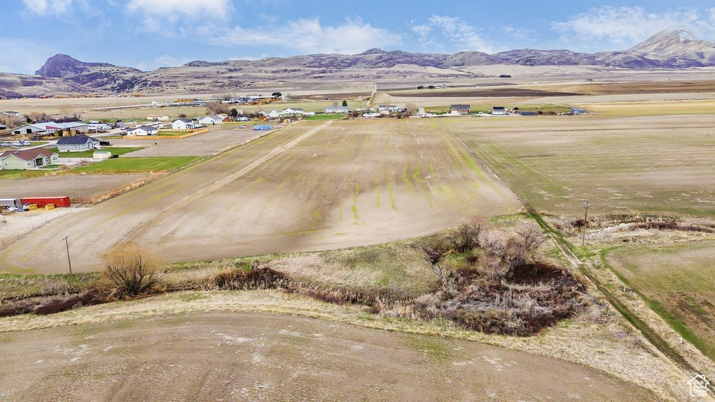 Birds eye view of property featuring a mountain view and a rural view