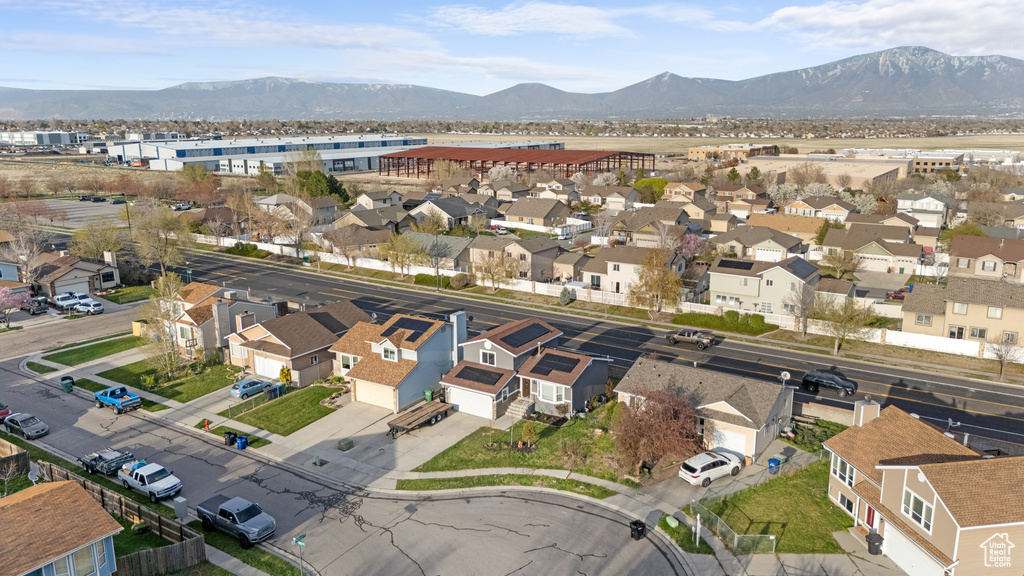 Birds eye view of property featuring a mountain view and a residential view