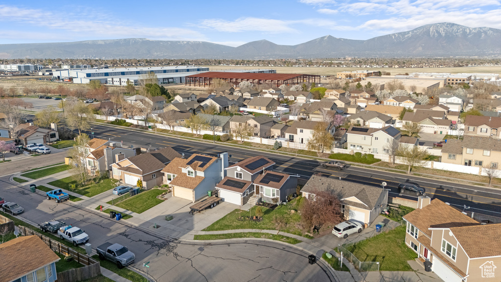 Drone / aerial view with a residential view and a mountain view