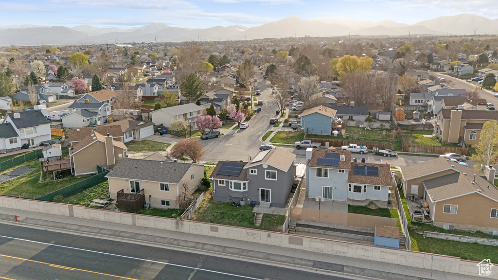 Drone / aerial view featuring a mountain view and a residential view