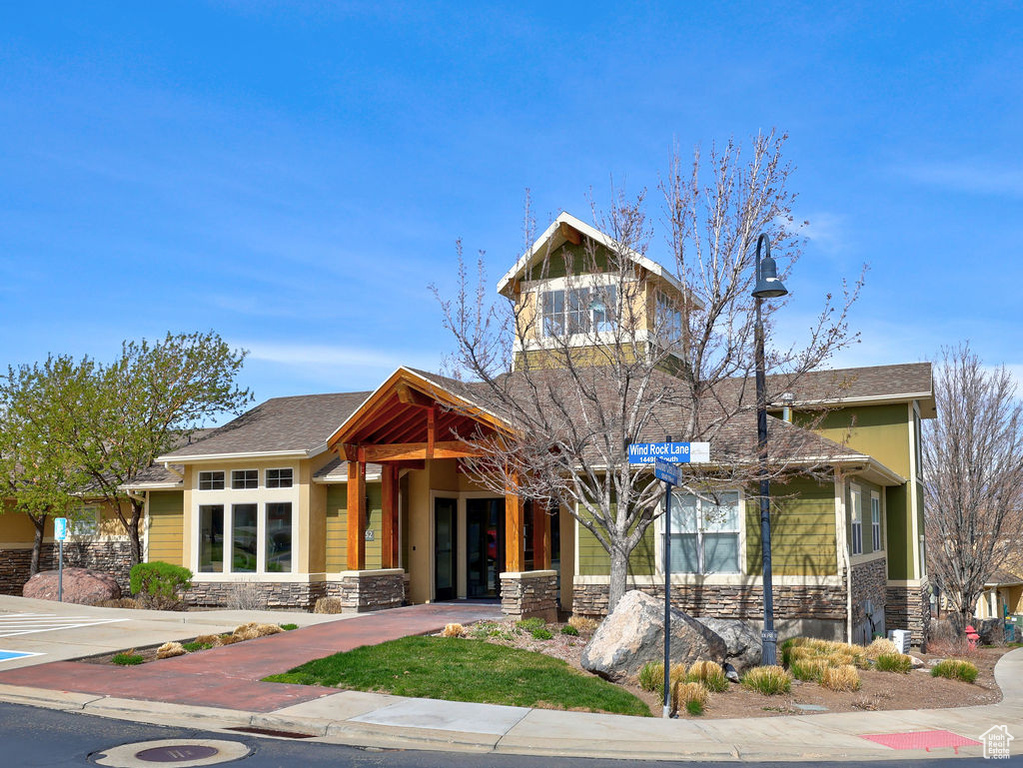 View of front of property with stone siding
