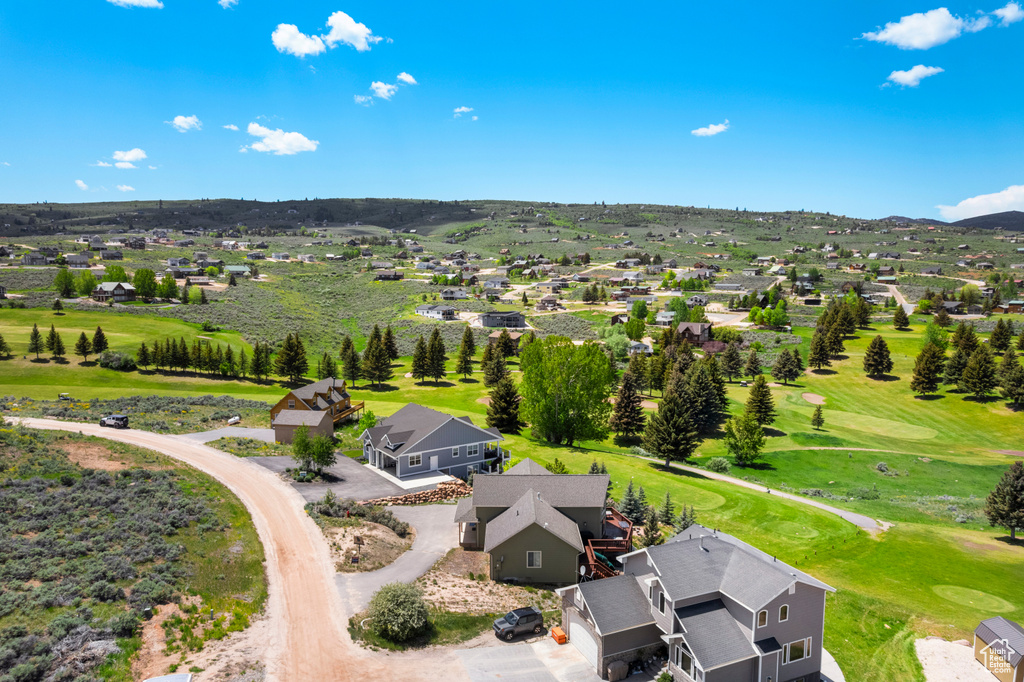 Aerial view of residential area with a golf club