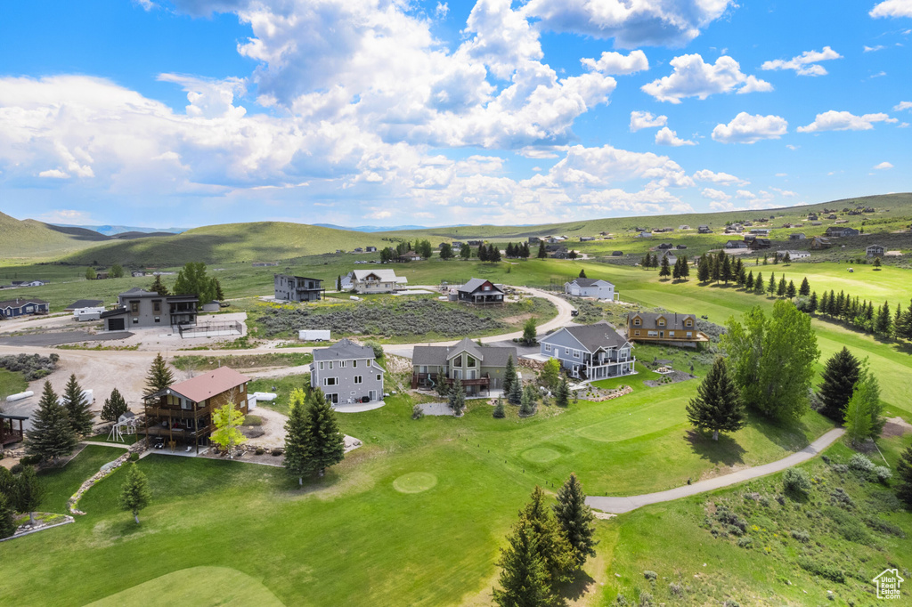 Aerial view of a local golf course and mountains