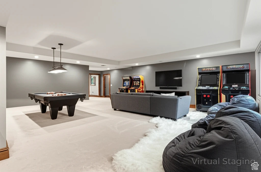 Rec room featuring recessed lighting, a raised ceiling, billiards table, and light colored carpet