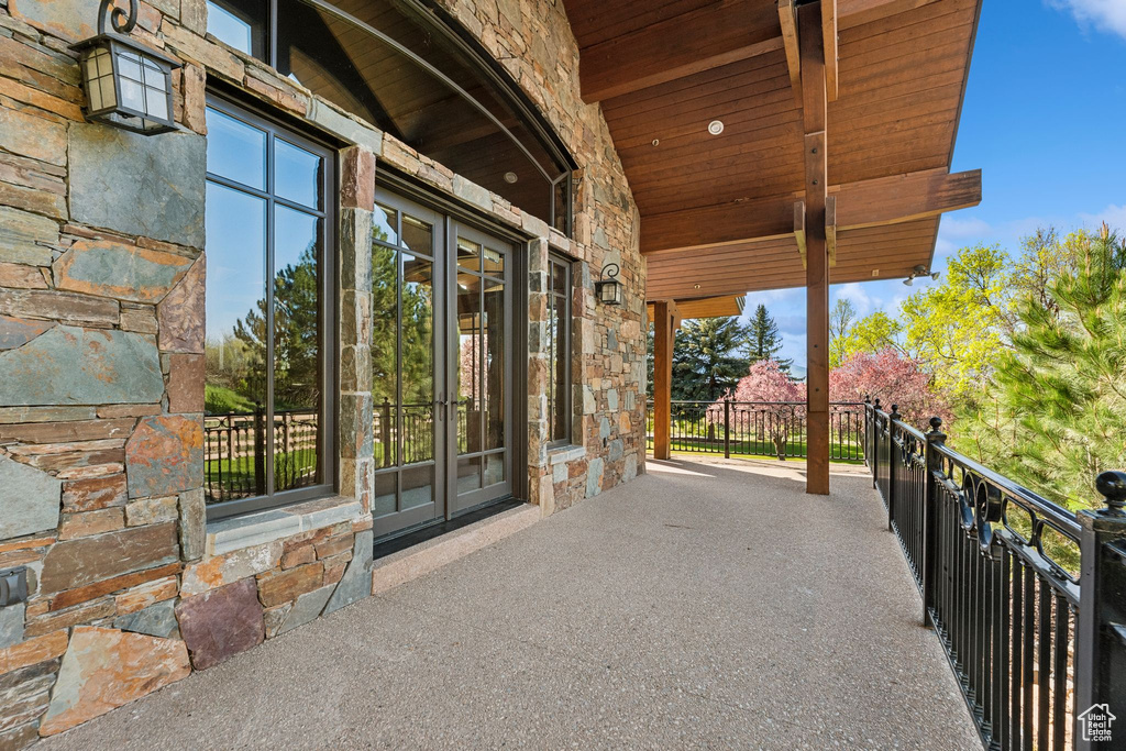 View of patio / terrace with a balcony and french doors