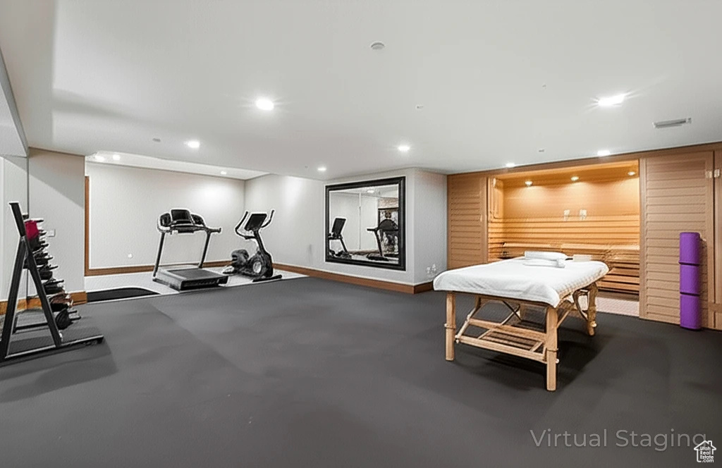 Exercise area with baseboards and recessed lighting