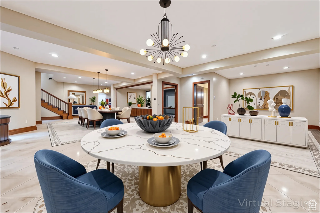 Dining space with a chandelier, light tile patterned floors, and recessed lighting
